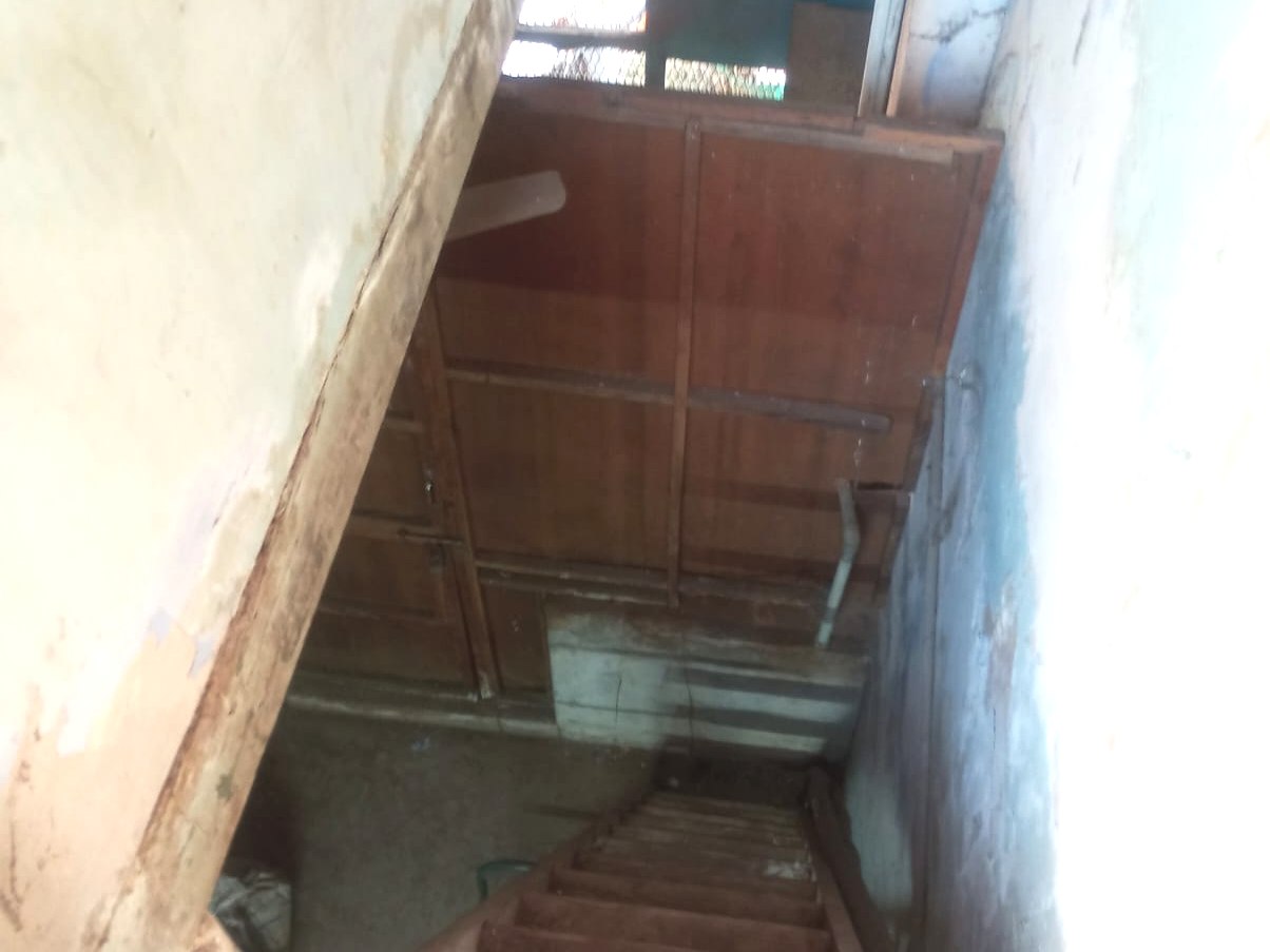 Traditional wooden staircase inside the Srirangam Thirumaligai